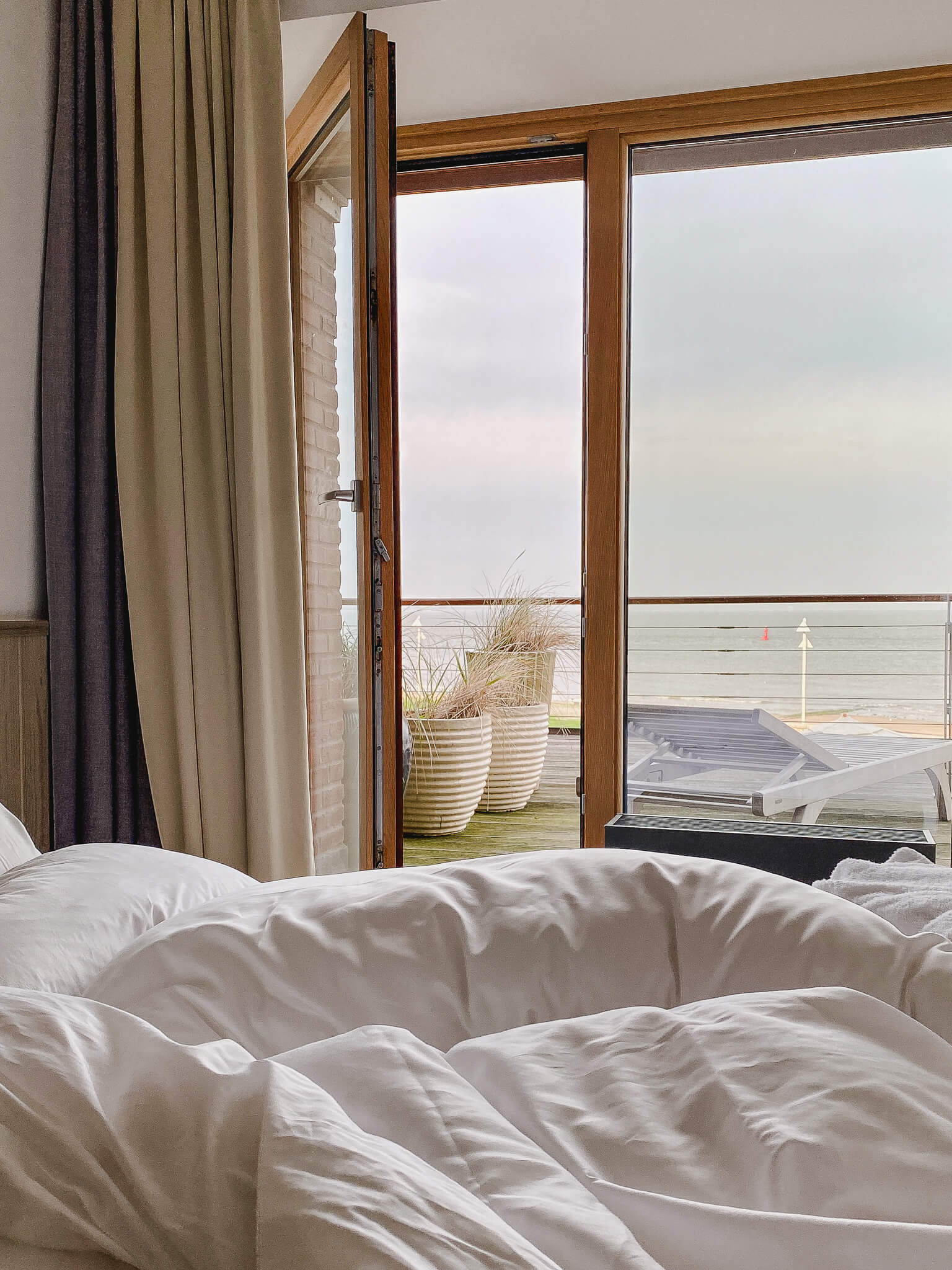 Blick vom Bett aufs Meer im Haus am Meer auf Norderney